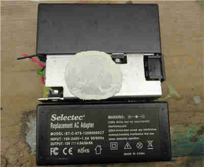 詳細(xì)記錄:拆解一款12V直流穩(wěn)壓電源適配器的全程 詳細(xì)記錄:拆解一款12V直流穩(wěn)壓電源適配器的全程